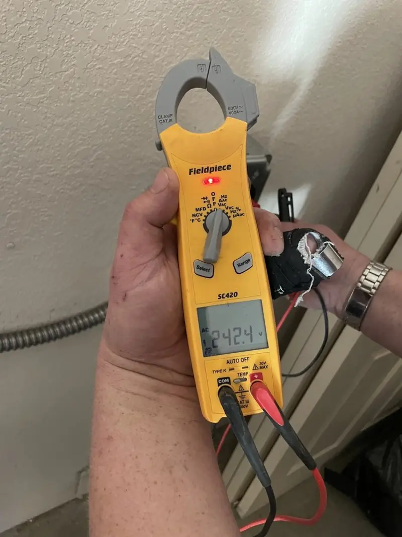 Voltage testing with clamp meter during Generator Installation in Live Oak